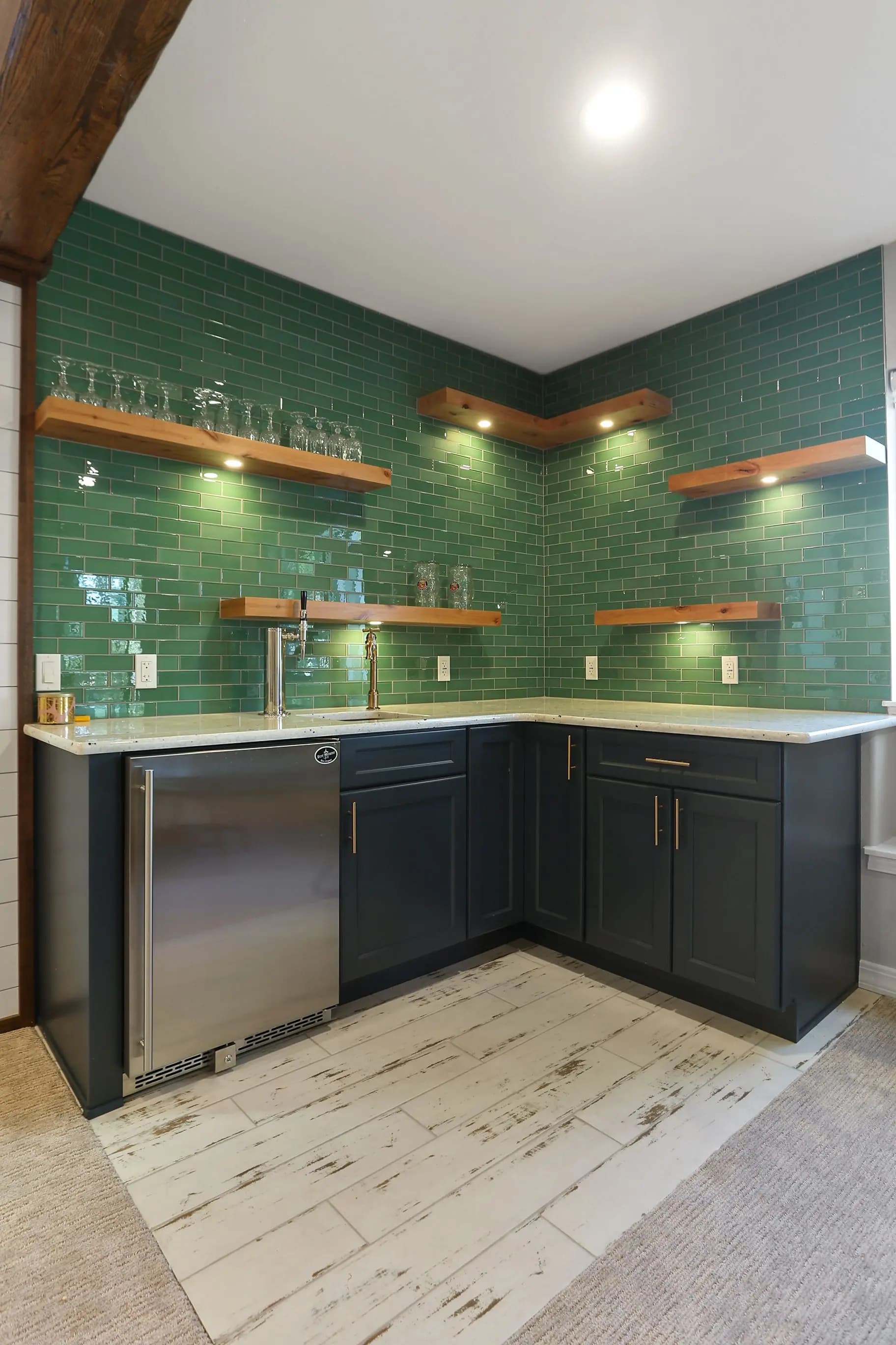 a countertop with an oven and cabinets