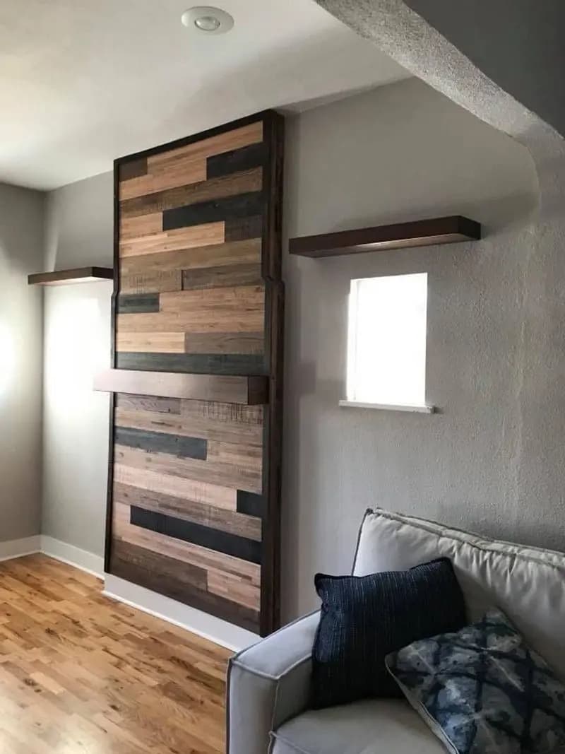 a room with a wood wall and a couch