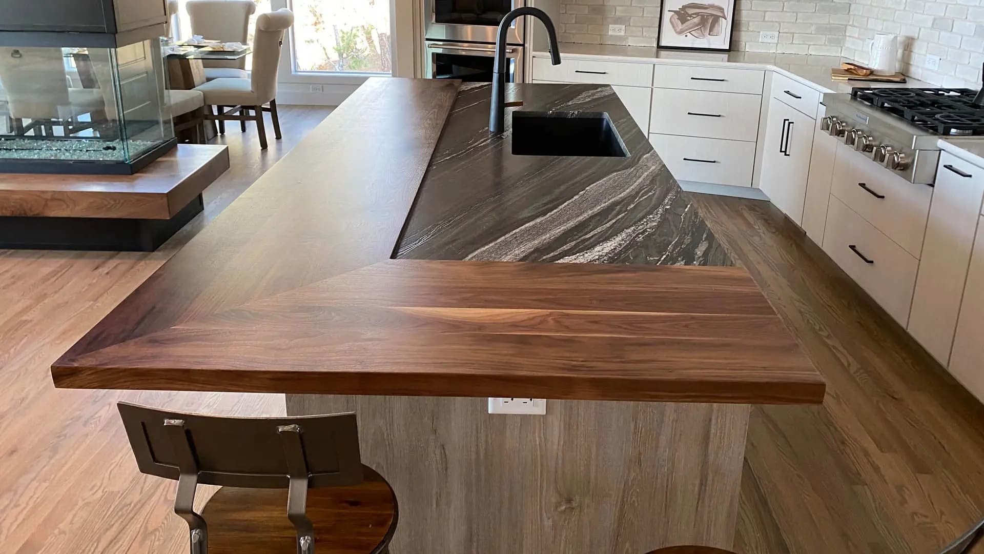 a kitchen island with a sink