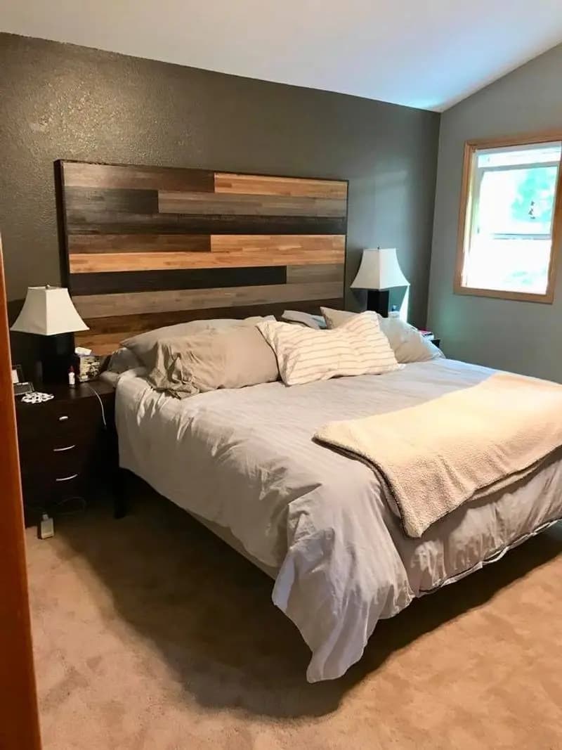 a bed with a wooden headboard