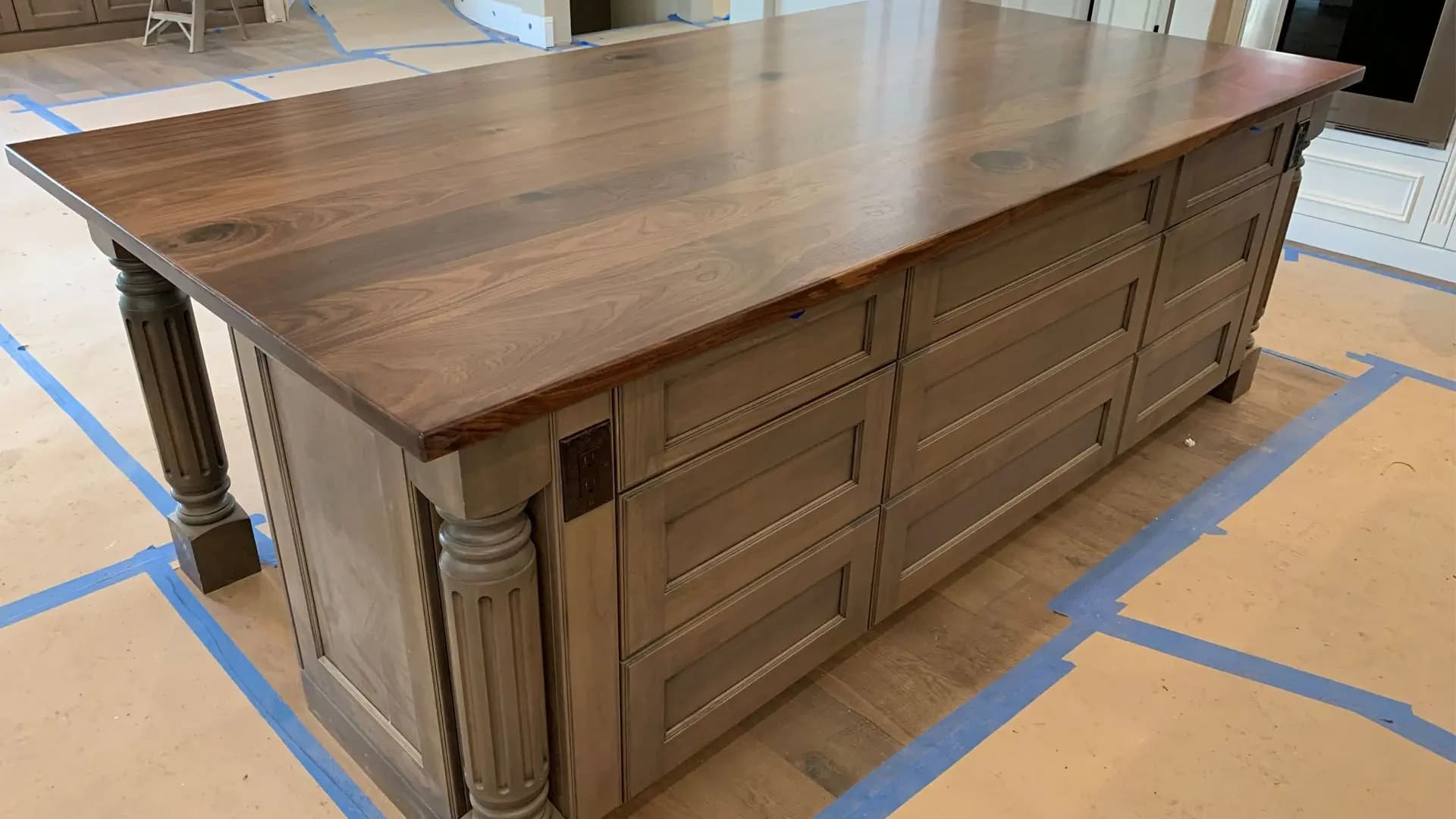 a wooden counter top with drawers